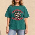 Dark Green Emotionally on Diversion oversized raccoon T-shirt worn outdoors in a lifestyle mockup